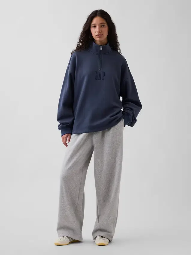 Pullover oversize pesante con logo e chiusura a un quarto di zip