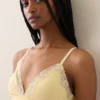 Reggiseno a triangolo in cotone elasticizzato biologico con bordi in pizzo