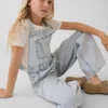 Salopette baggy a righe in denim per bambini