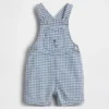 Salopette corta da neonato in denim a quadretti con tasca a forma di orsetto