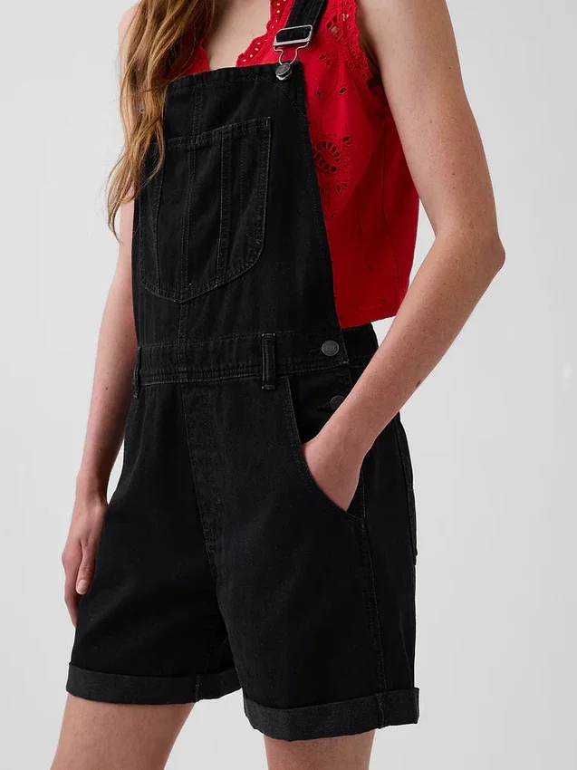 Salopette corta in denim dal taglio ampio