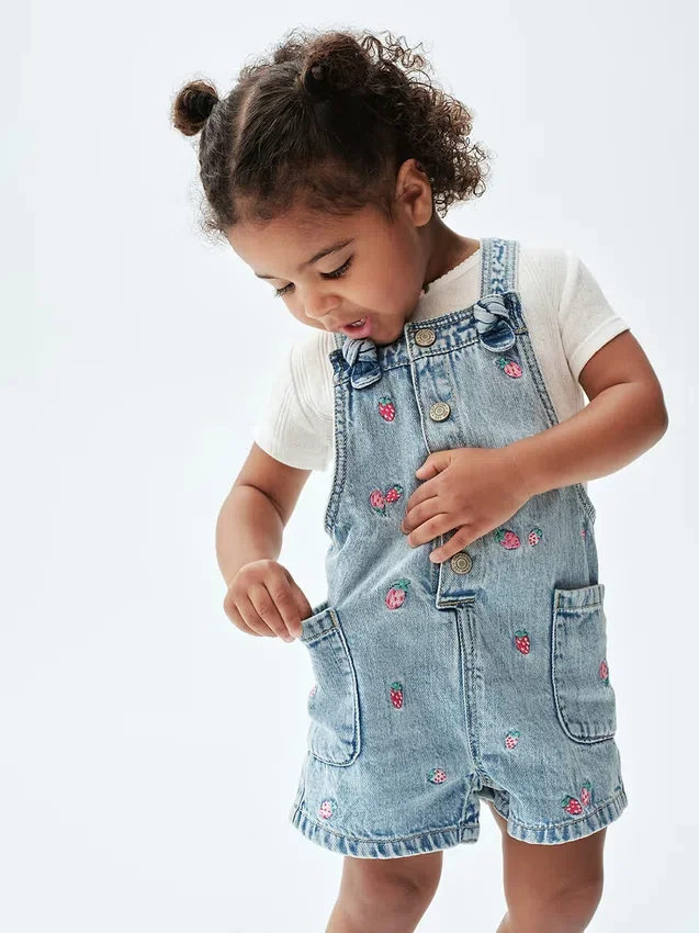 Salopette in denim ricamata per neonato & bebè