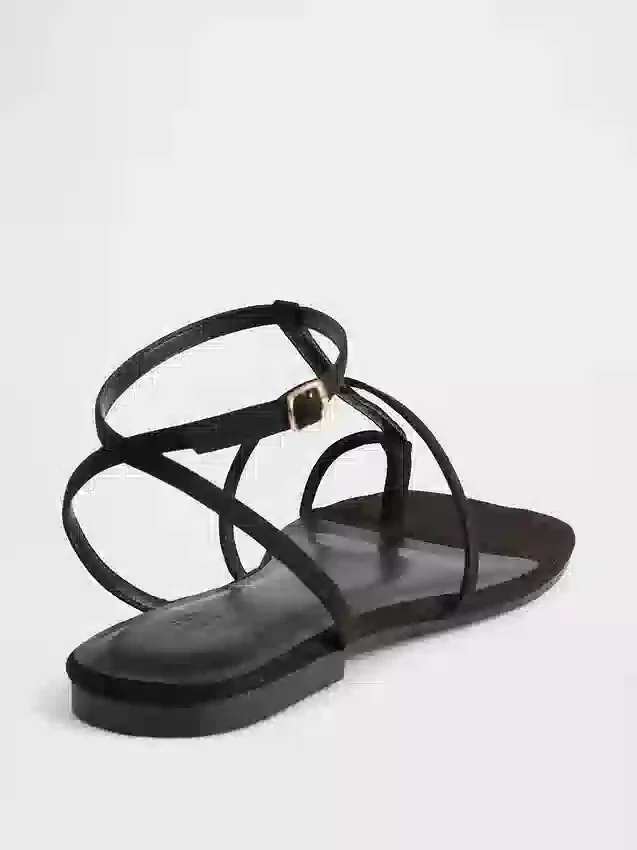 Sandali con cinturino a T in pelle scamosciata vegana
