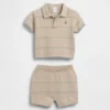 Set con maglione e pantaloncini a righe in stile polo per neonati