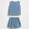 Set di abbigliamento in denim con taschine per neonati