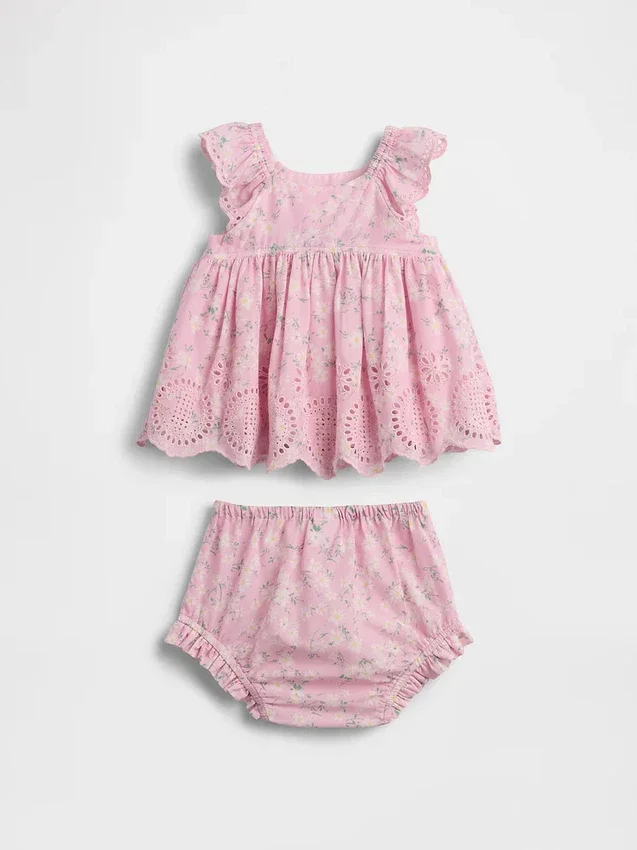 Set per neonati con dettagli traforati
