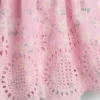Set per neonati con dettagli traforati