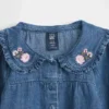 Set per neonati in denim a motivi floreali