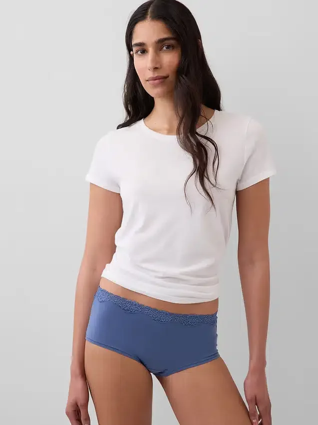 Shorts in cotone biologico elasticizzato con bordi in pizzo