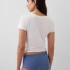 Shorts in cotone biologico elasticizzato con bordi in pizzo