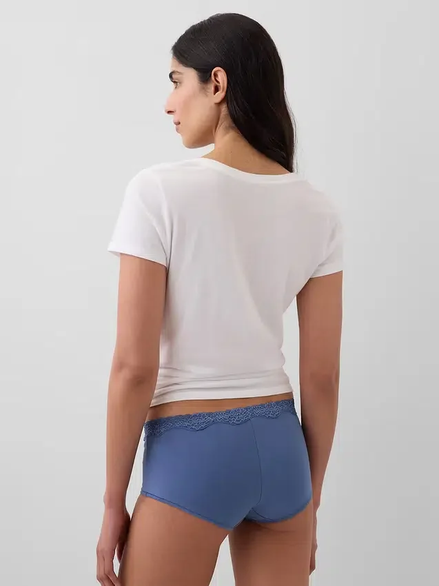 Shorts in cotone biologico elasticizzato con bordi in pizzo