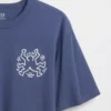 T-shirt oversize con grafica di Keith Haring