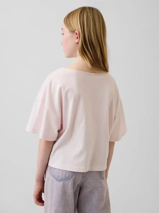 T-shirt oversize per bambini con scollo ampio