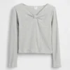 T-shirt per bambini con collo a fiocco