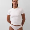 Tanga in cotone biologico elasticizzato con bordi in pizzo