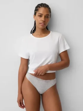 Tanga in cotone biologico elasticizzato con bordi in pizzo