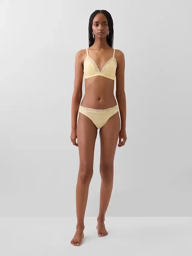 Tanga in cotone biologico elasticizzato con bordi in pizzo