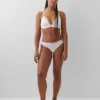 Tanga in cotone biologico elasticizzato con bordi in pizzo