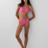 Tanga in cotone biologico elasticizzato con bordi in pizzo