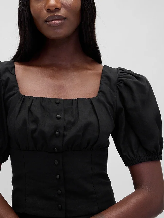 Top a corsetto corto con maniche a sbuffo in misto lino