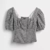 Top a corsetto corto con maniche a sbuffo in misto lino