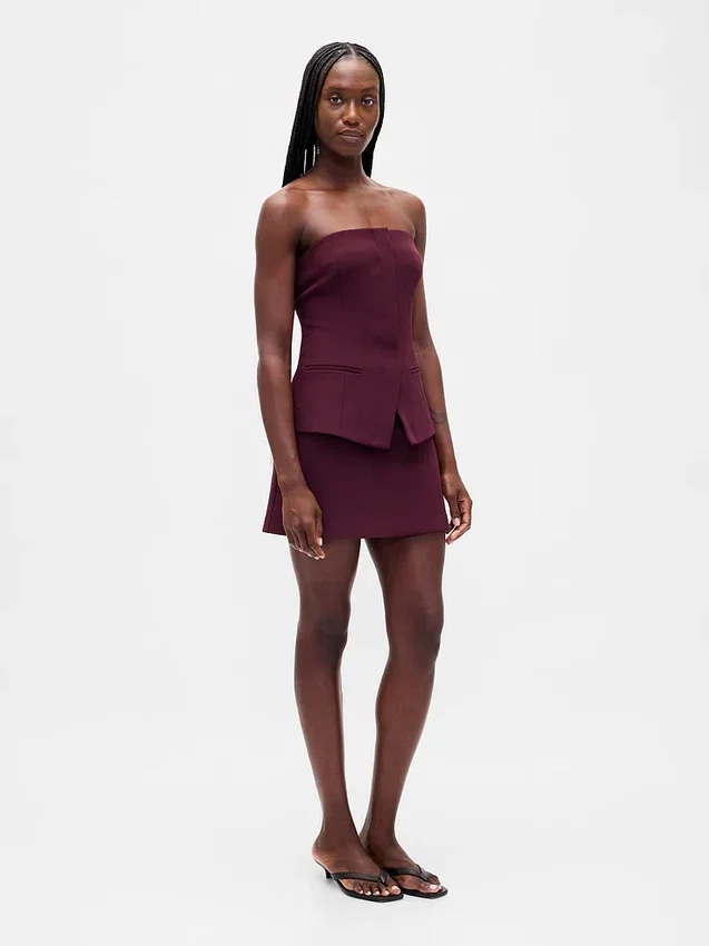 Top a corsetto senza spalline in tessuto bistretch