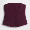 Top a corsetto senza spalline in tessuto bistretch