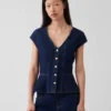 Top aderente in denim con maniche ad aletta e peplo