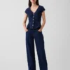 Top aderente in denim con maniche ad aletta e peplo