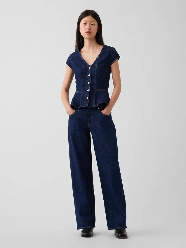 Top aderente in denim con maniche ad aletta e peplo