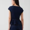 Top aderente in denim con maniche ad aletta e peplo