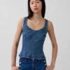 Top aderente in denim con peplo