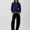 Top aderente in denim con peplo