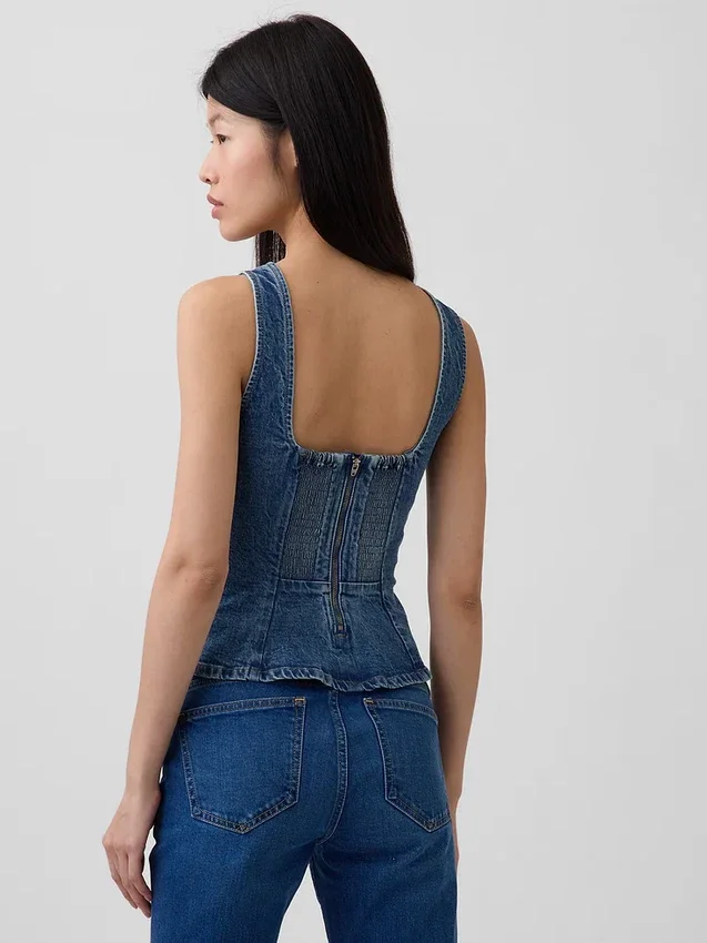 Top aderente in denim con peplo