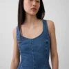 Top aderente in denim con peplo