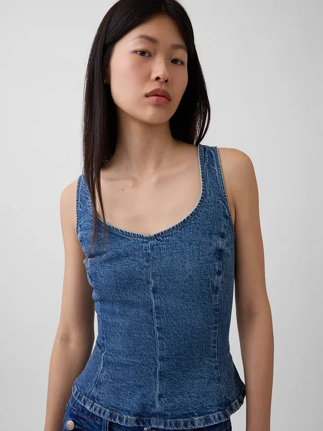 Top aderente in denim con peplo