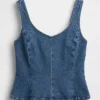 Top aderente in denim con peplo