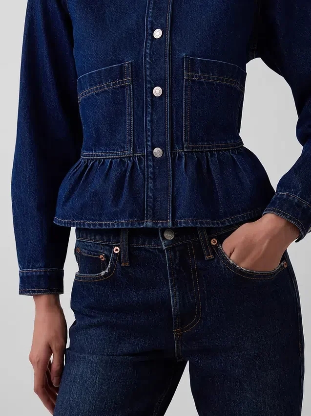 Top aderente in denim con peplo