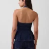 Top aderente in denim con scollo all’americana e peplo