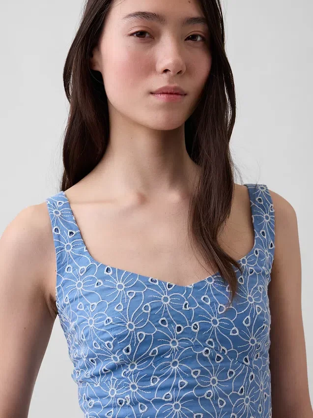 Top bustier corto con occhielli