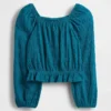 Top con peplo in maglia stropicciata per bambini