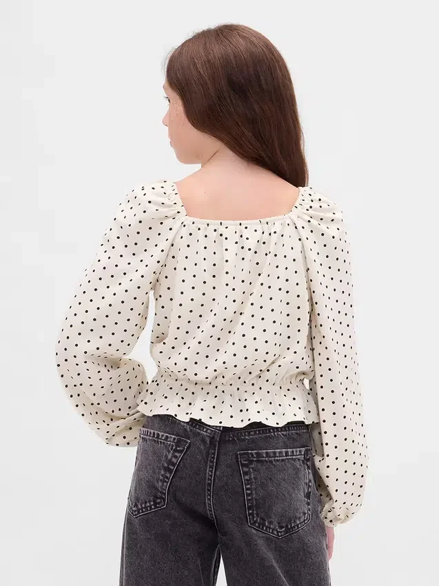Top con peplo in maglia stropicciata per bambini