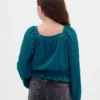 Top con peplo in maglia stropicciata per bambini