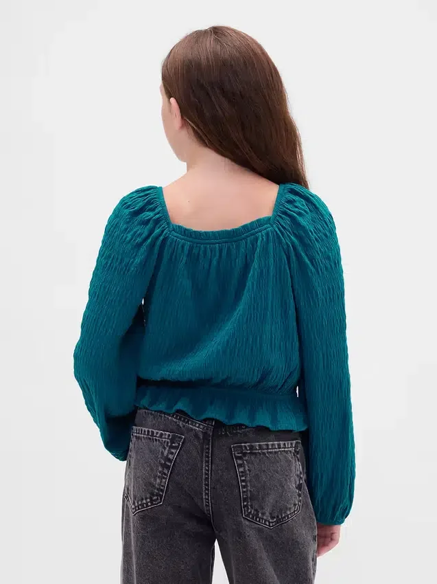 Top con peplo in maglia stropicciata per bambini