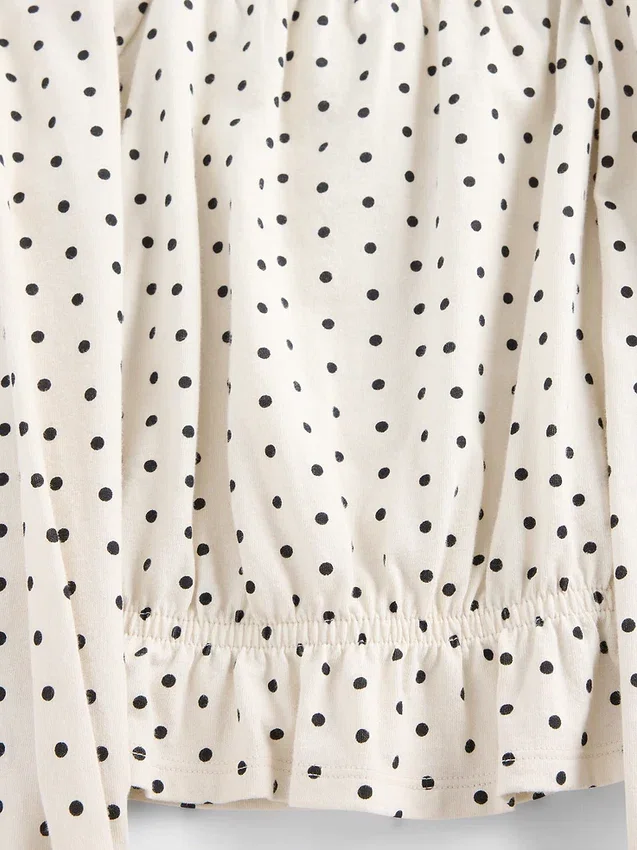 Top con peplo in maglia stropicciata per bambini