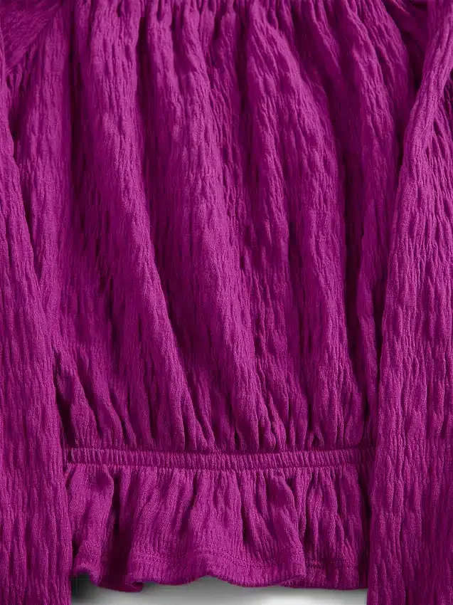 Top con peplo in maglia stropicciata per bambini