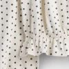 Top con peplo in maglia stropicciata per bambini