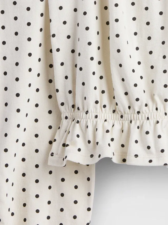 Top con peplo in maglia stropicciata per bambini