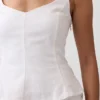 Top con peplo in misto lino