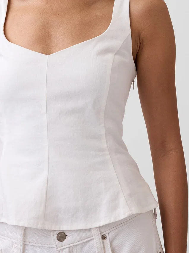 Top con peplo in misto lino